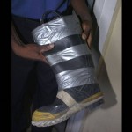 boot with duct tape repair